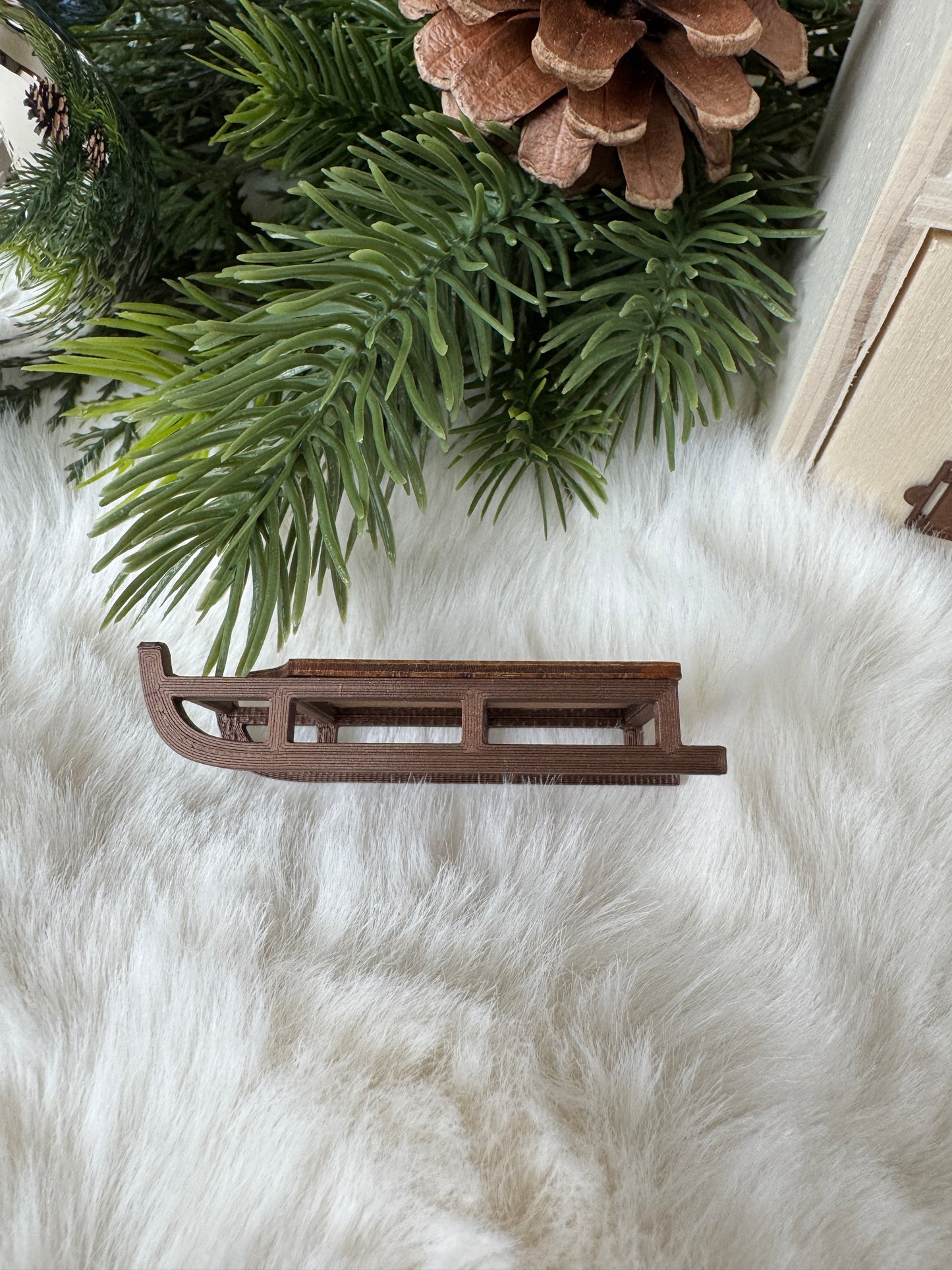 Miniature winter sled detail view, 1:12 scale dollhouse decor