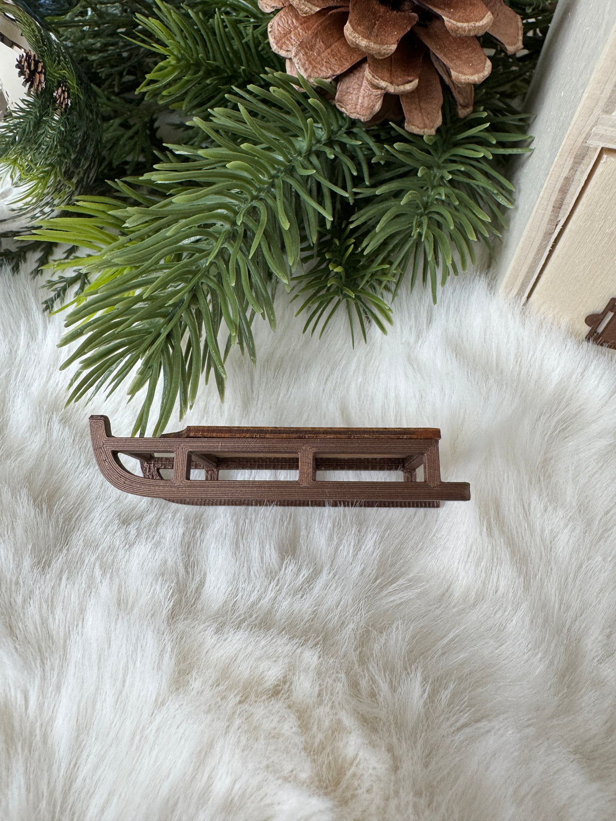 Miniature winter sled detail view, 1:12 scale dollhouse decor