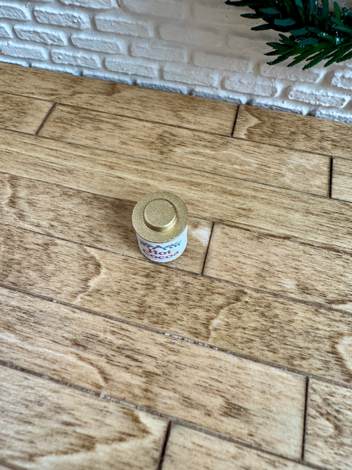 Miniature Christmas cocoa canister, close-up detail, 1:12 scale dollhouse