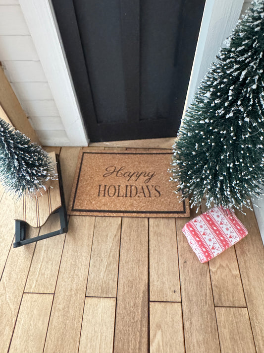 Miniature "Happy Holidays" front door mat for dollhouse