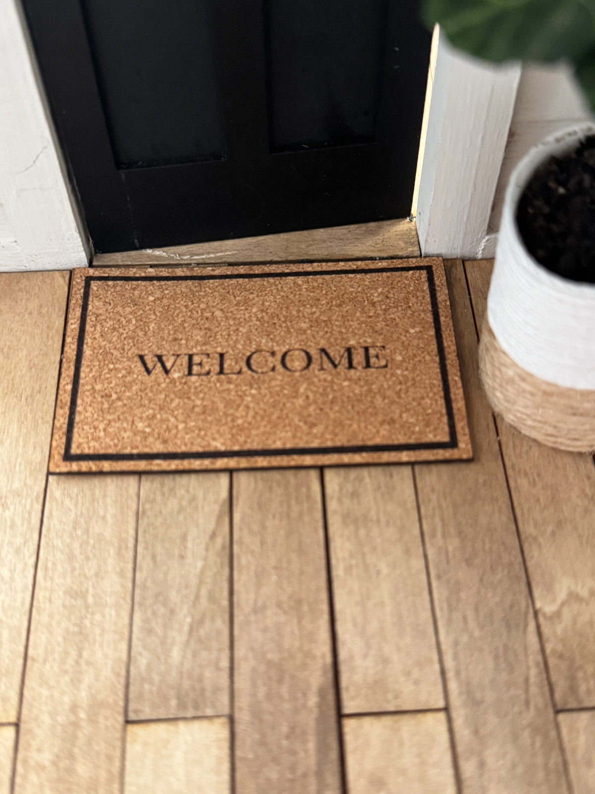 Miniature "Welcome" front door mat, close-up detail for dollhouse
