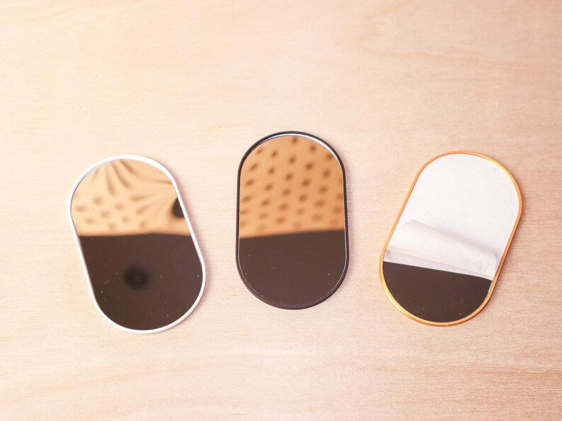 Pill shaped dollhouse mirror, close-up detail, 1:12 scale wide wall mirror