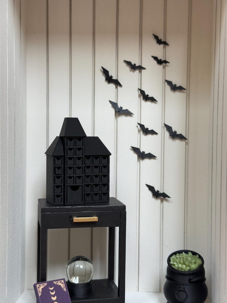 Dollhouse bat wall decor, close-up detail, 1:12 scale miniature Halloween bats